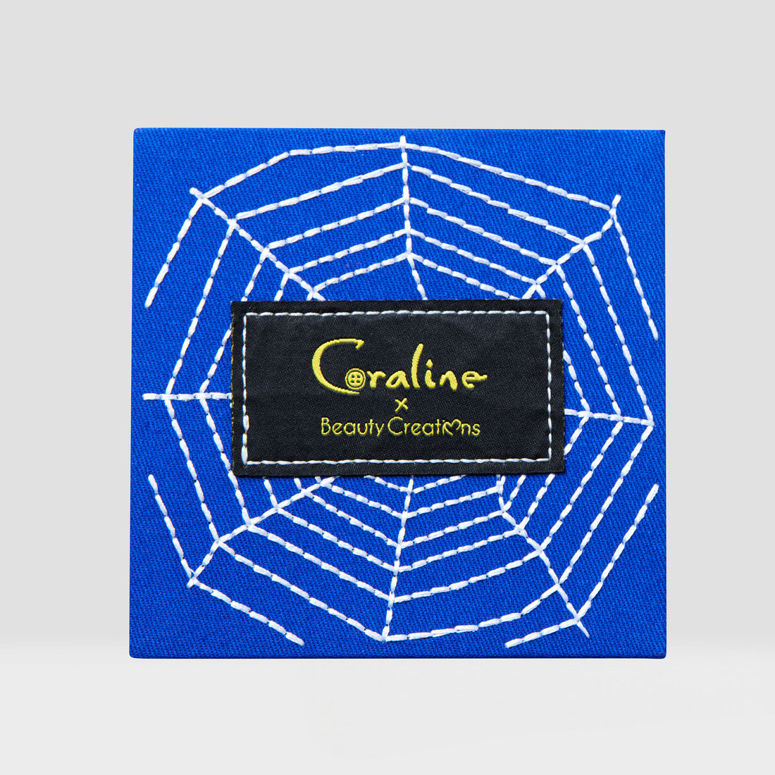 paleta de rubores y iluminadores Mother's web Coraline x Beauty Creations